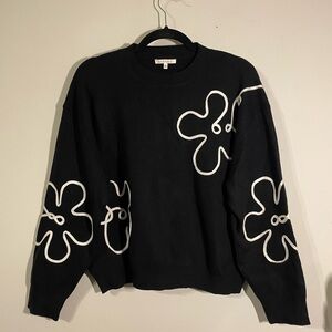 Elegant Black and White Floral Sweater